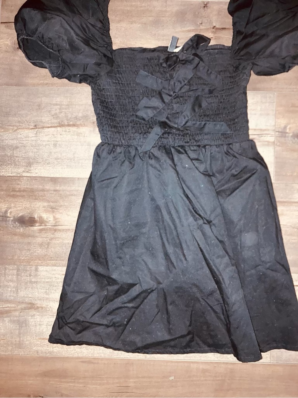 Woman’s ' Black Puff Sleeve Smocked Dress